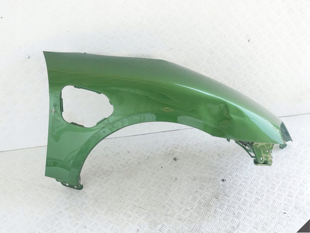 PORSCHE TAYCAN 9J1 BŁOTNIK PRAWY PRZÓD USZK.