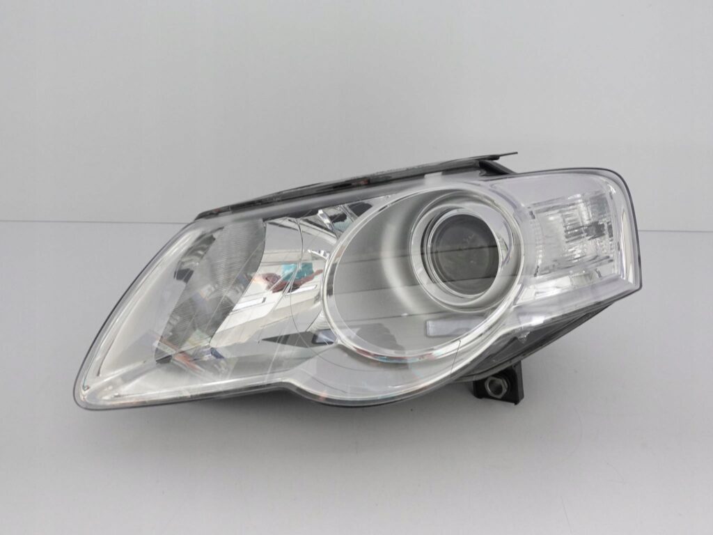 VW PASSAT B6 3C0 05-10 LAMPA LEWA ZWYKŁA H7 EU