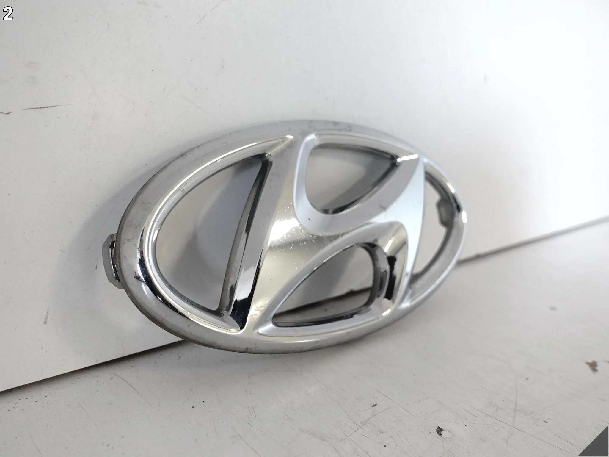 HYUNDAI KONA I 17-20 ZNACZEK LOGO EMBLEMAT GRILL ZDERZAK PRZÓD 86354-J9000 bed298f317daeb47759a3c1cf2f61c17