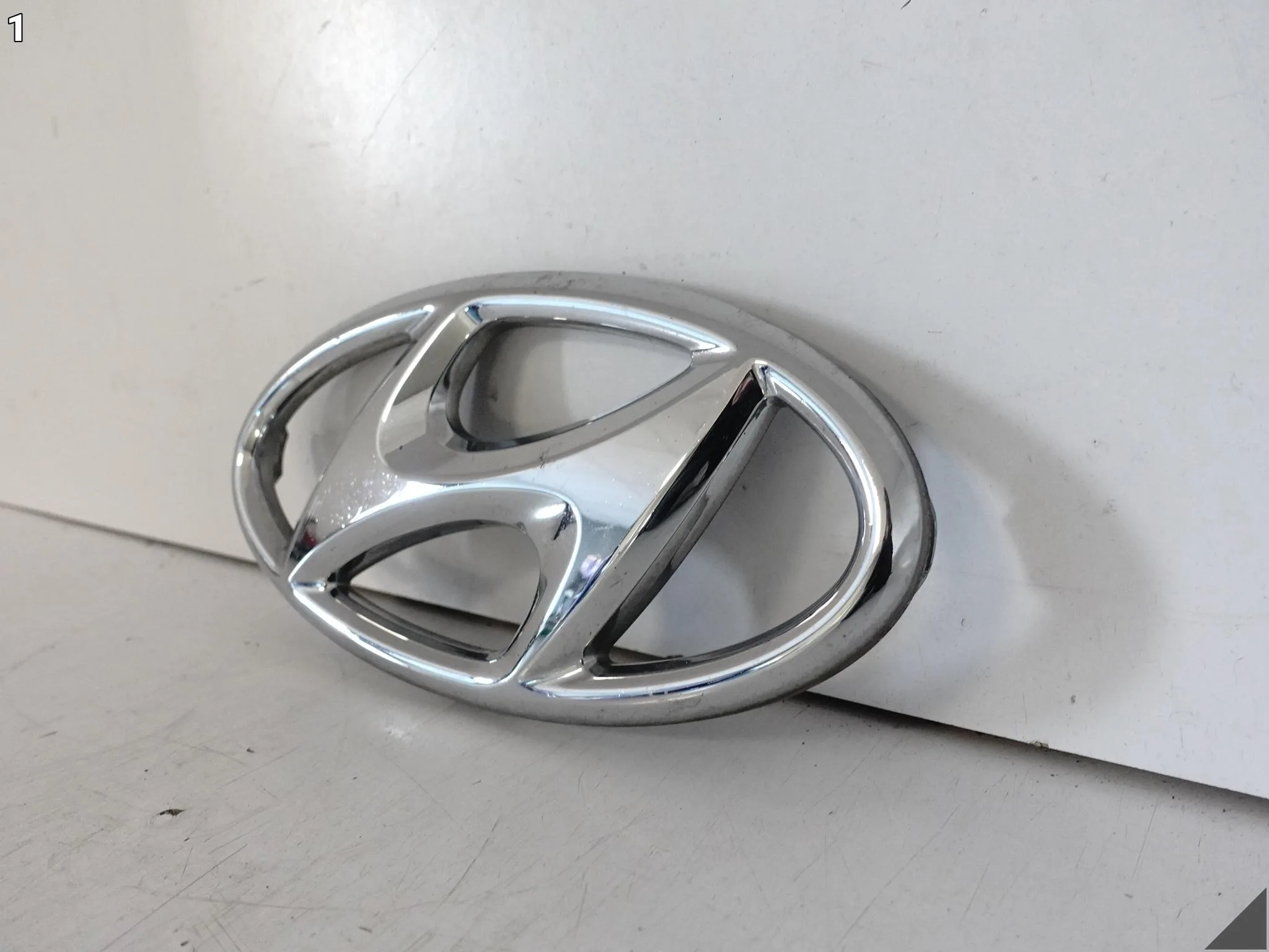 HYUNDAI KONA I 17-20 ZNACZEK LOGO EMBLEMAT GRILL ZDERZAK PRZÓD 86354-J9000 ae0104320c44f830424c73bedbc30b9d