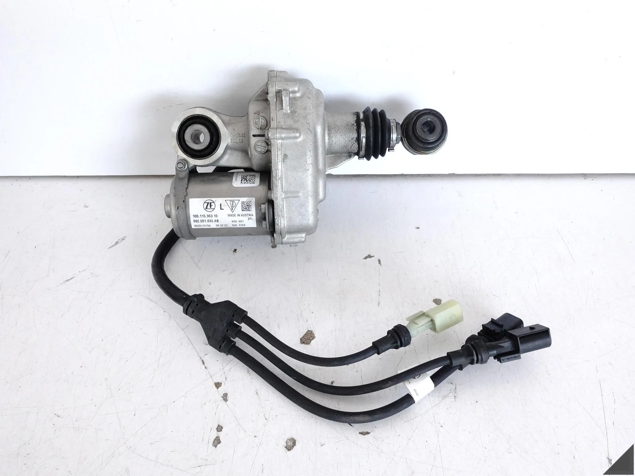 PORSCHE 911 992 19- MECHANIZM SILNICZEK UKŁADU SKRĘTNEGO TYLNEJ OSI LEWY 378f2d44130995f5df7aa59093624175