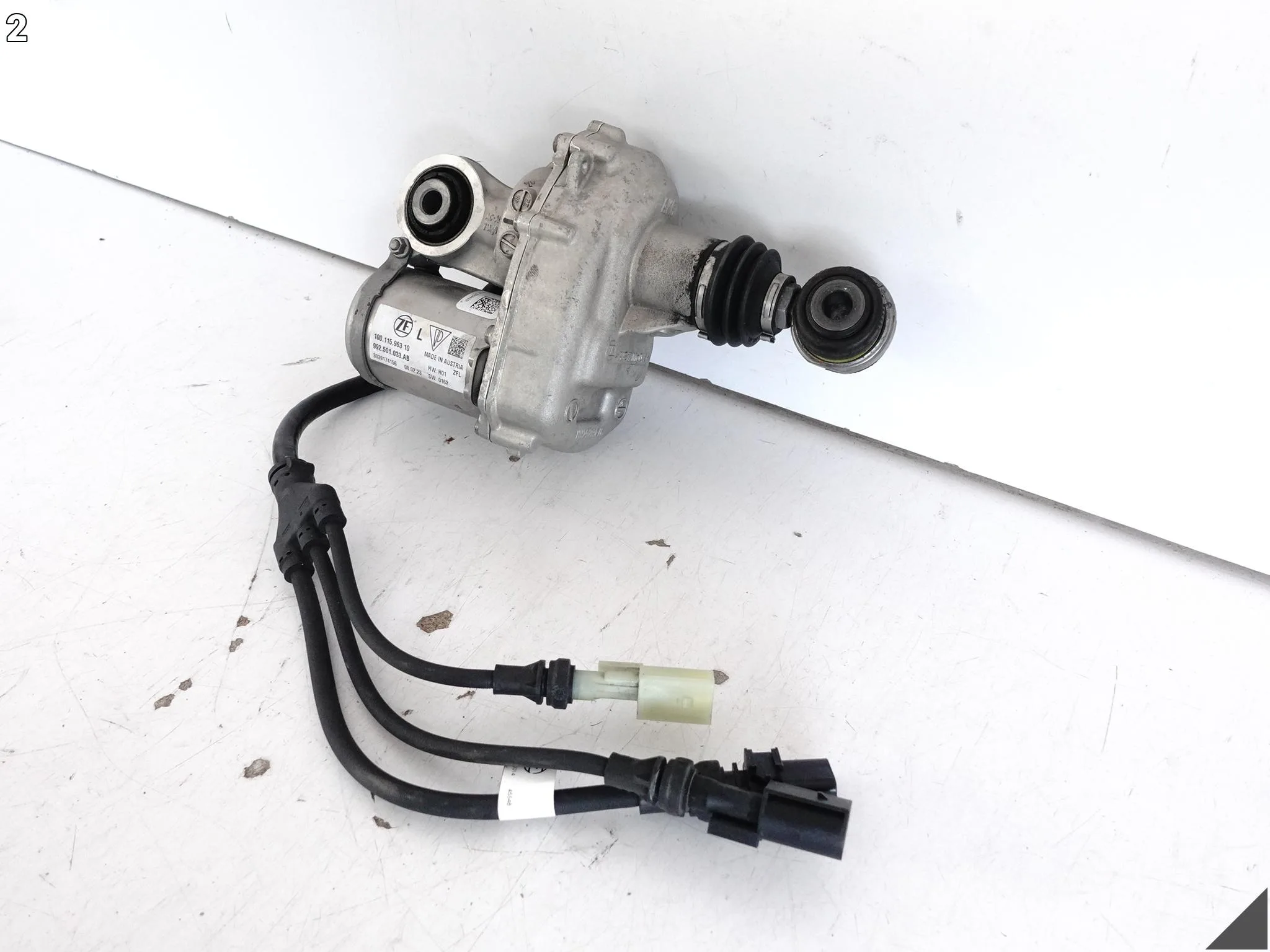 PORSCHE 911 992 19- MECHANIZM SILNICZEK UKŁADU SKRĘTNEGO TYLNEJ OSI LEWY 464fb6d678178ff1b26f7bad427242ec
