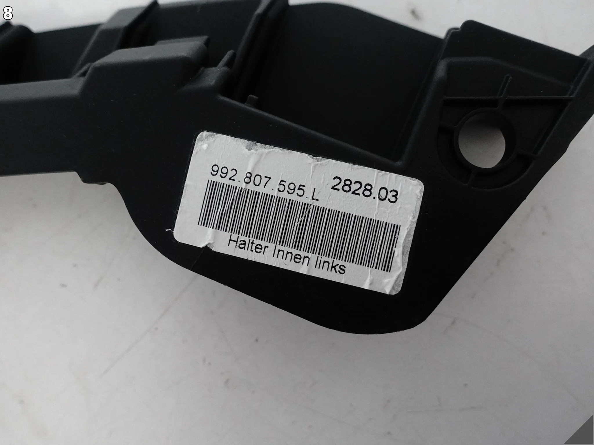 PORSCHE 911 992 19-25 ŚLIZG WSPORNIK LISTWA POD LAMPĘ ZDERZAK PRZÓD LEWY 803a694543aeadd3abb5ff99b67f62c6