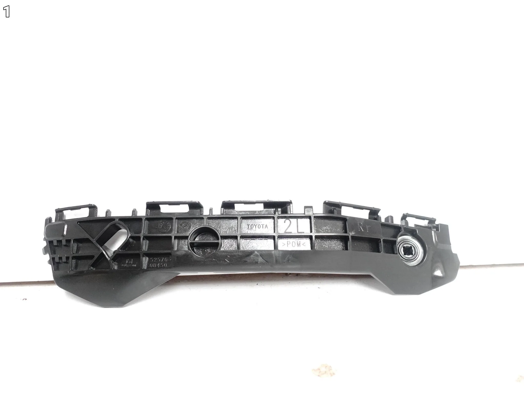 TOYOTA YARIS III XP150 LIFT 17-20 ŚLIZG MOCOWANIE W ZDERZAK TYŁ LEWY ORG 223376516e2d6fe00a66123c177ef85b