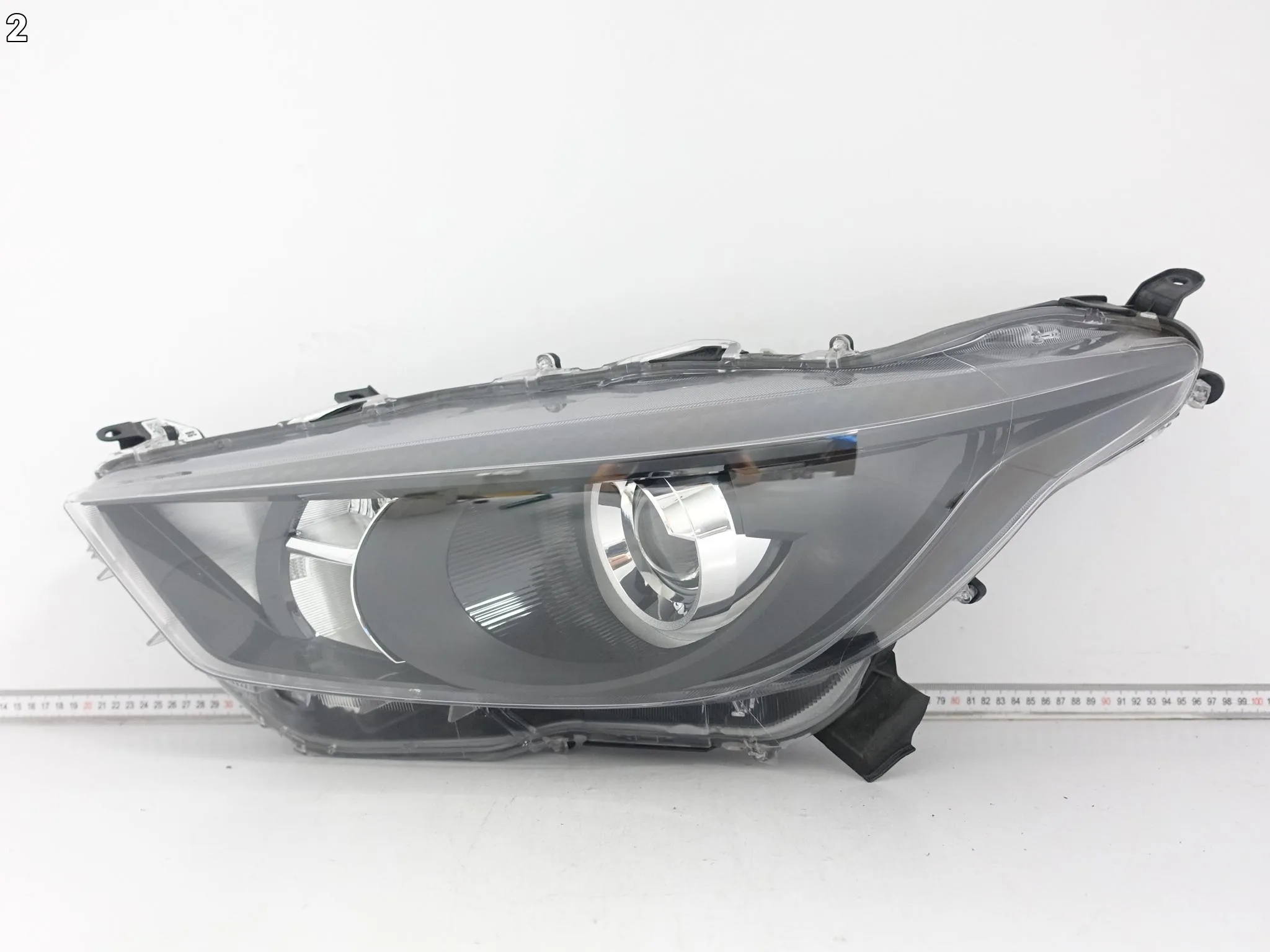 TOYOTA YARIS IV 4 XP210 20- LAMPA ZWYKŁA SOCZEWKA LEWA PRZÓD EUROPA 442101da000b7daa1a3130f572324daf